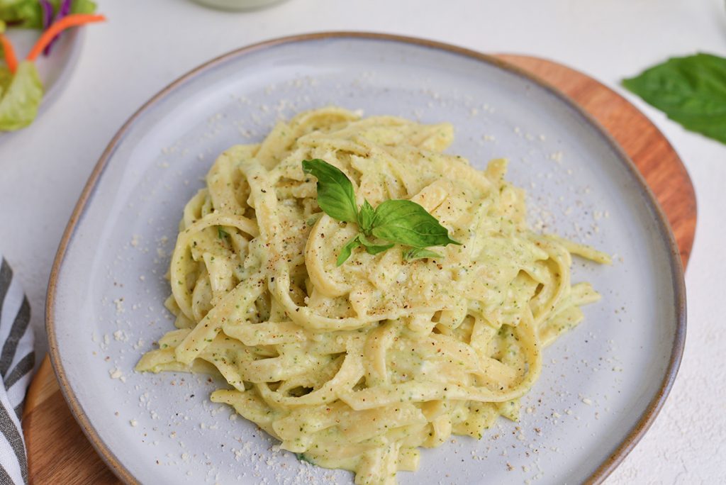 creamy basil pesto pasta on a plate