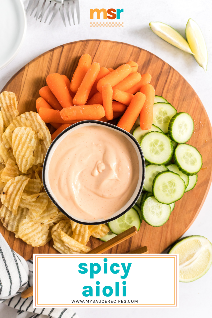 bowl of spicy aioli surrounded by dippers with text overlay for pinterest