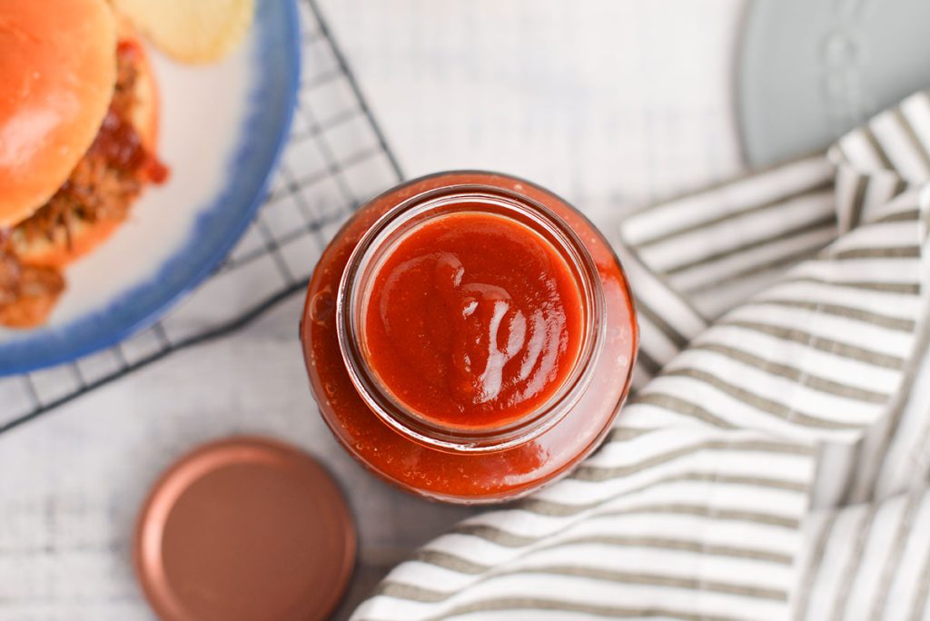 overhead shot of jar of bbq sauce