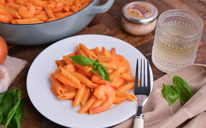 plate of pasta with pink pasta sauce