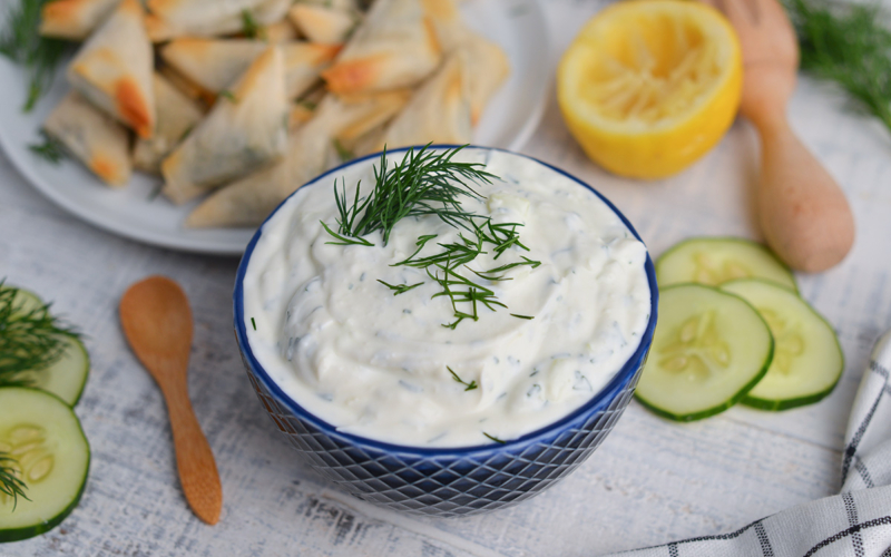 angled shot of bowl of tzatziki sauce