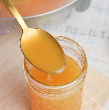 spoon in jar of bourbon sauce
