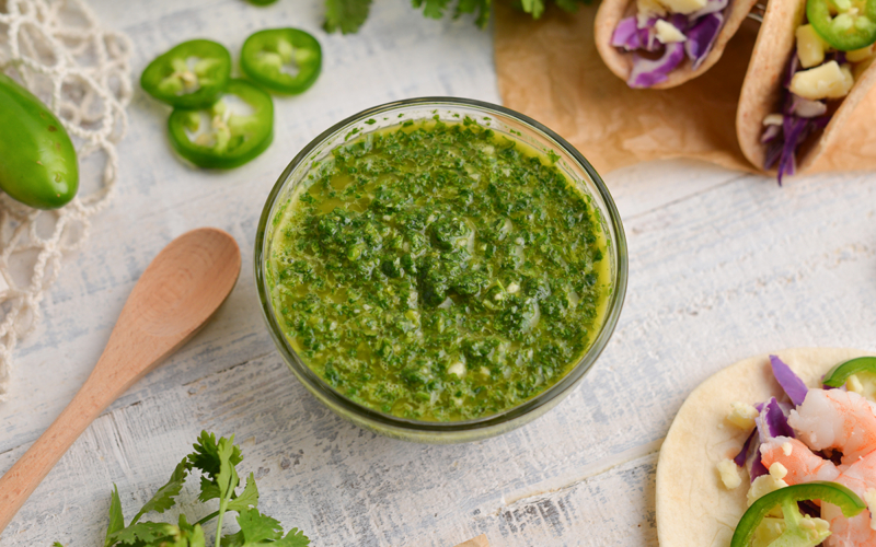 angled shot of cilantro sauce in a bowl