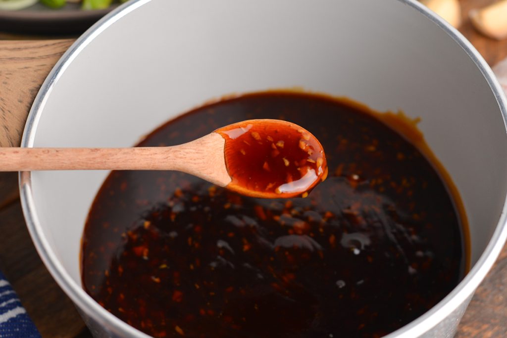 spoon in honey garlic sauce