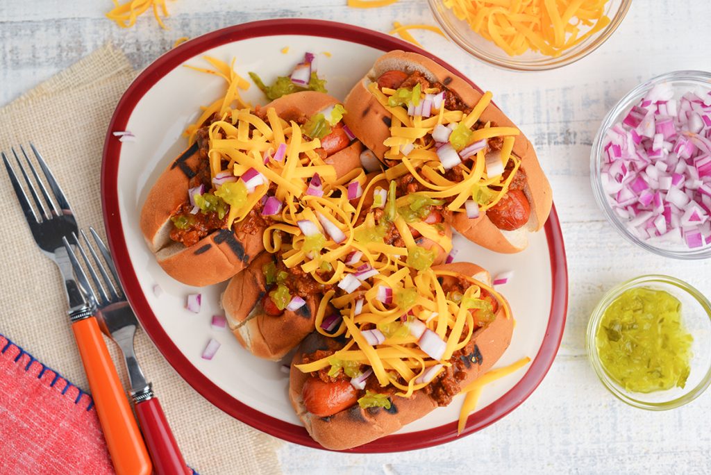 overhead shot of hot dogs with hot dog sauce