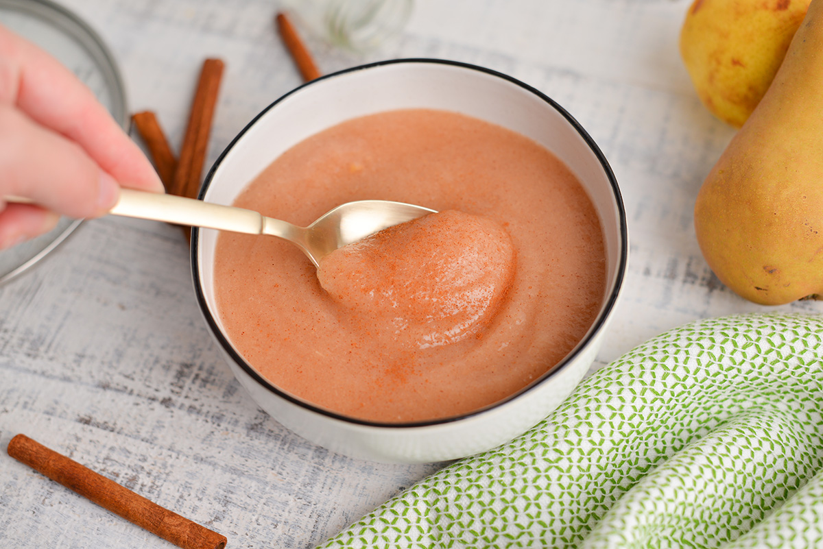 spoon in bowl of sauce