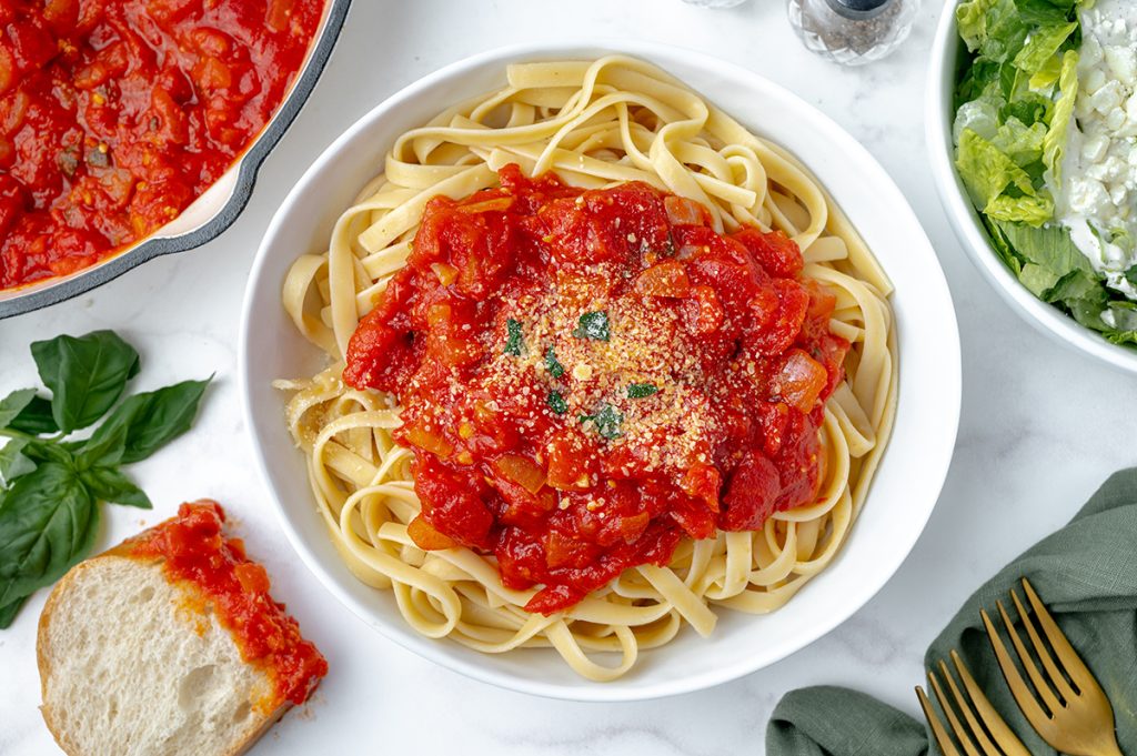 plate of pasta with spicy marinara sauce