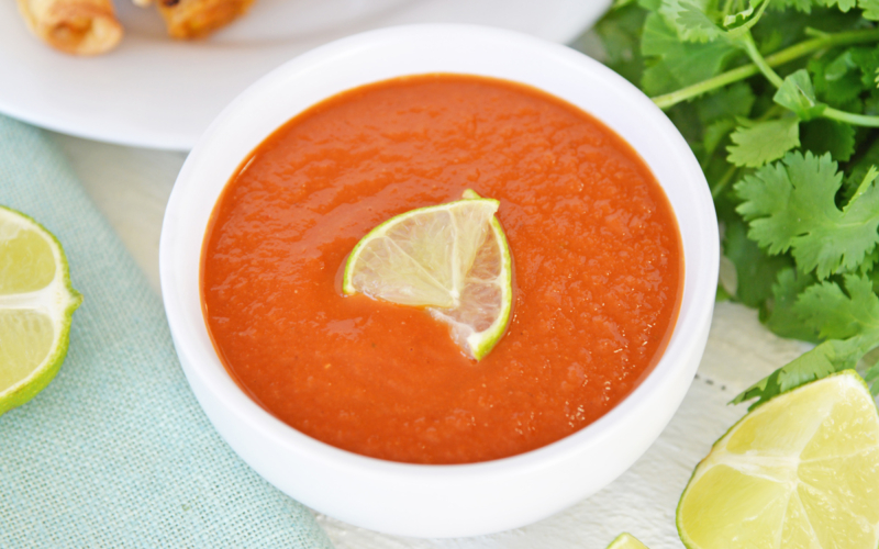 angled shot of bowl of ranchero sauce