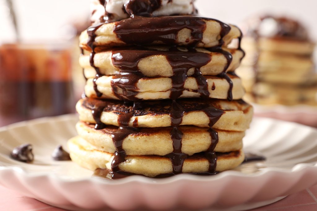 pancakes topped with chocolate sauce