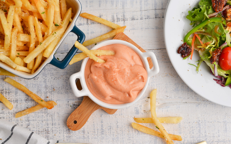 overhead shot of bowl of fry sauce with fries