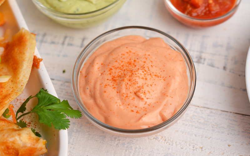 angled shot of bowl of creamy sauce