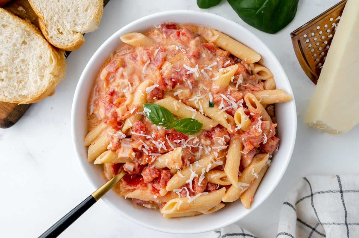 bowl of pasta coated in creamy vodka sauce