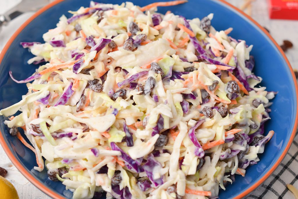 close up of creamy coleslaw in a bowl