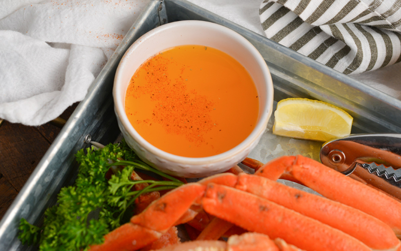 angled shot of white bowl of crab butter