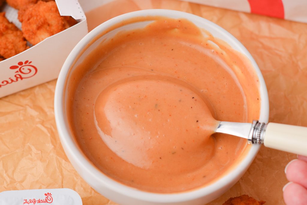 close up of spoon in bowl of chick-fil-a sauce