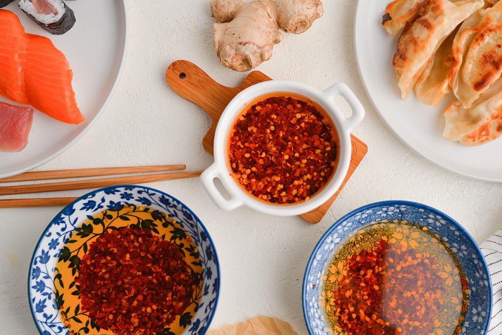 overhead shot of bowls of spicy oil