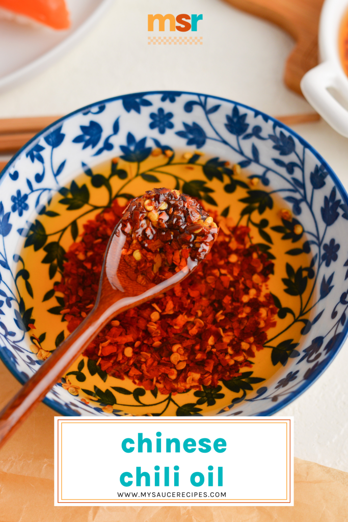 angled shot of spoon in bowl of chinese chili oil with text overlay for pinterest