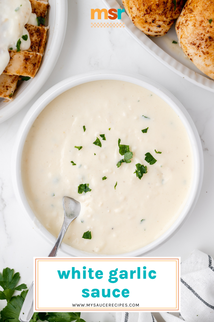 overhead shot of bowl of white garlic sauce with text overlay for pinterest