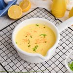 angled shot of hollandaise sauce in a bowl