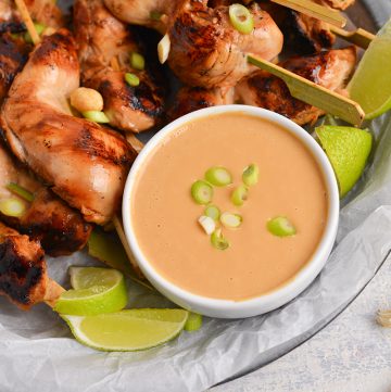 bowl of spicy peanut sauce with chicken