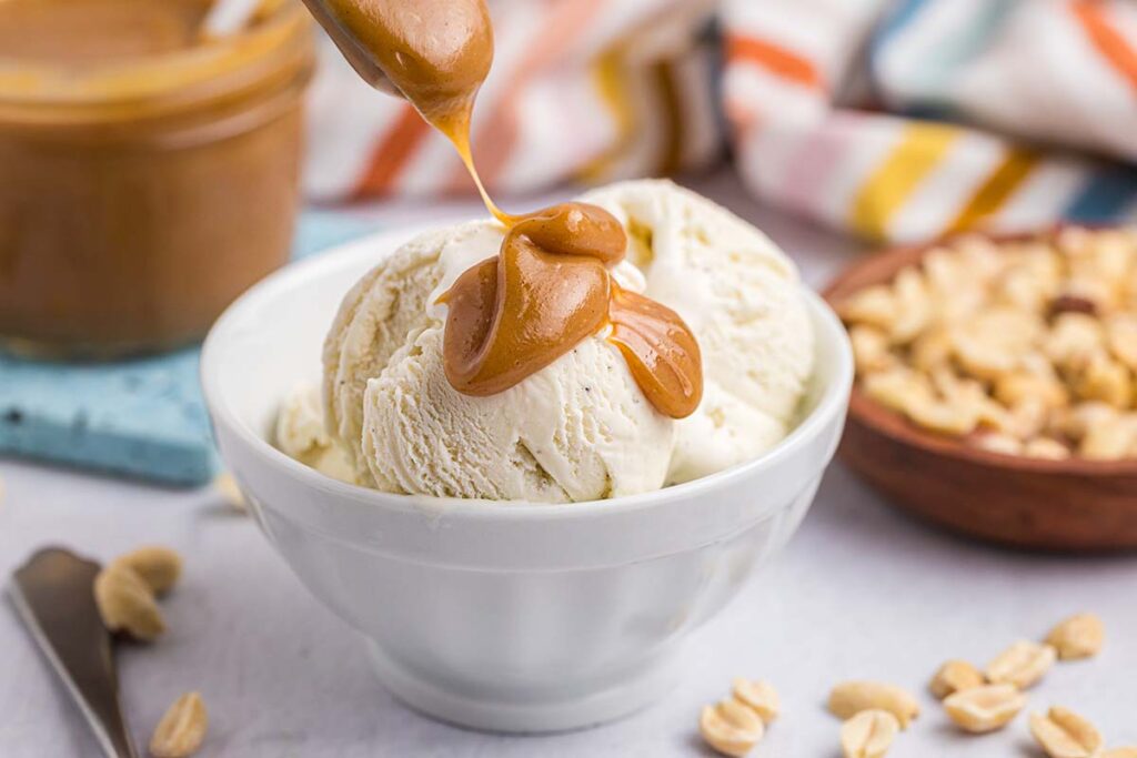 peanut butter sauce drizzled onto ice cream