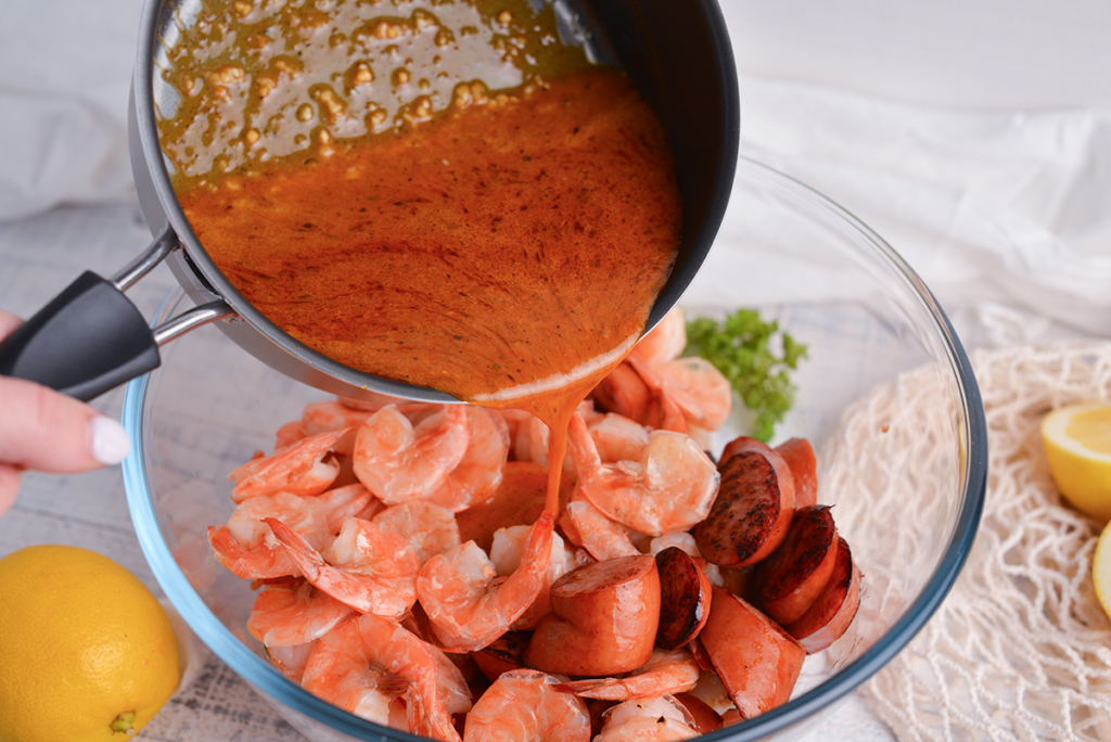 boiling crab sauce recipe poured over shrimp