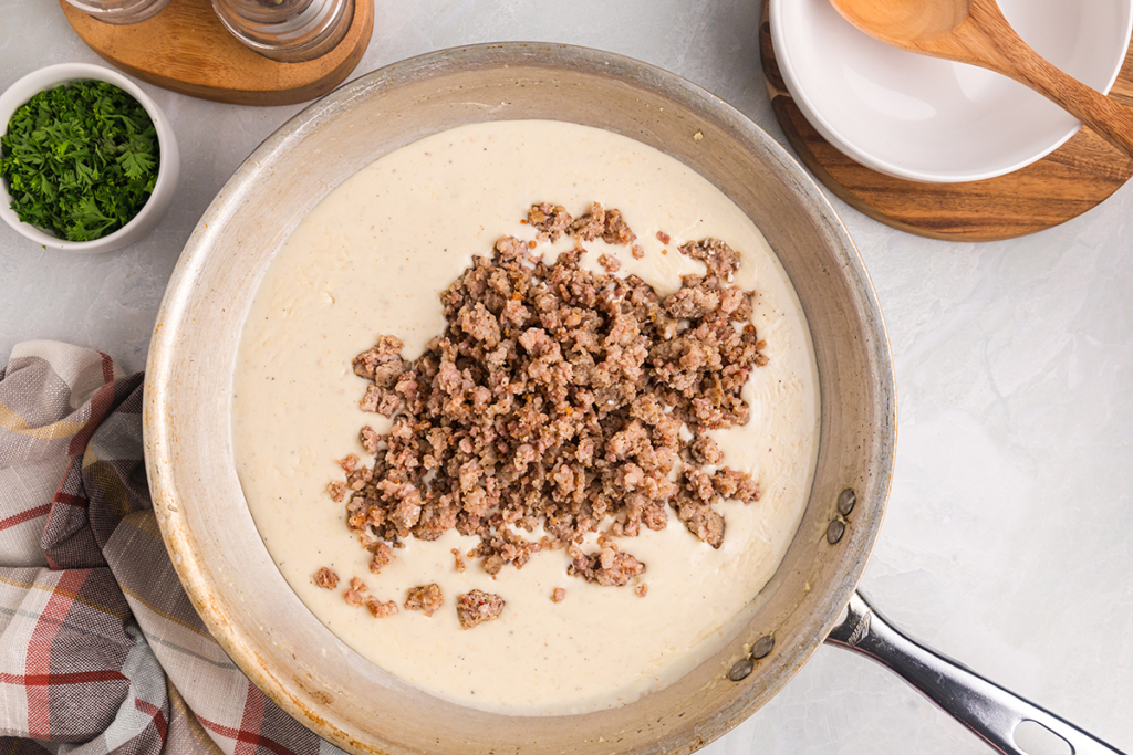 sausage added to creamy gravy