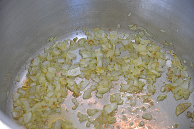 onion and garlic sauteeing in pan