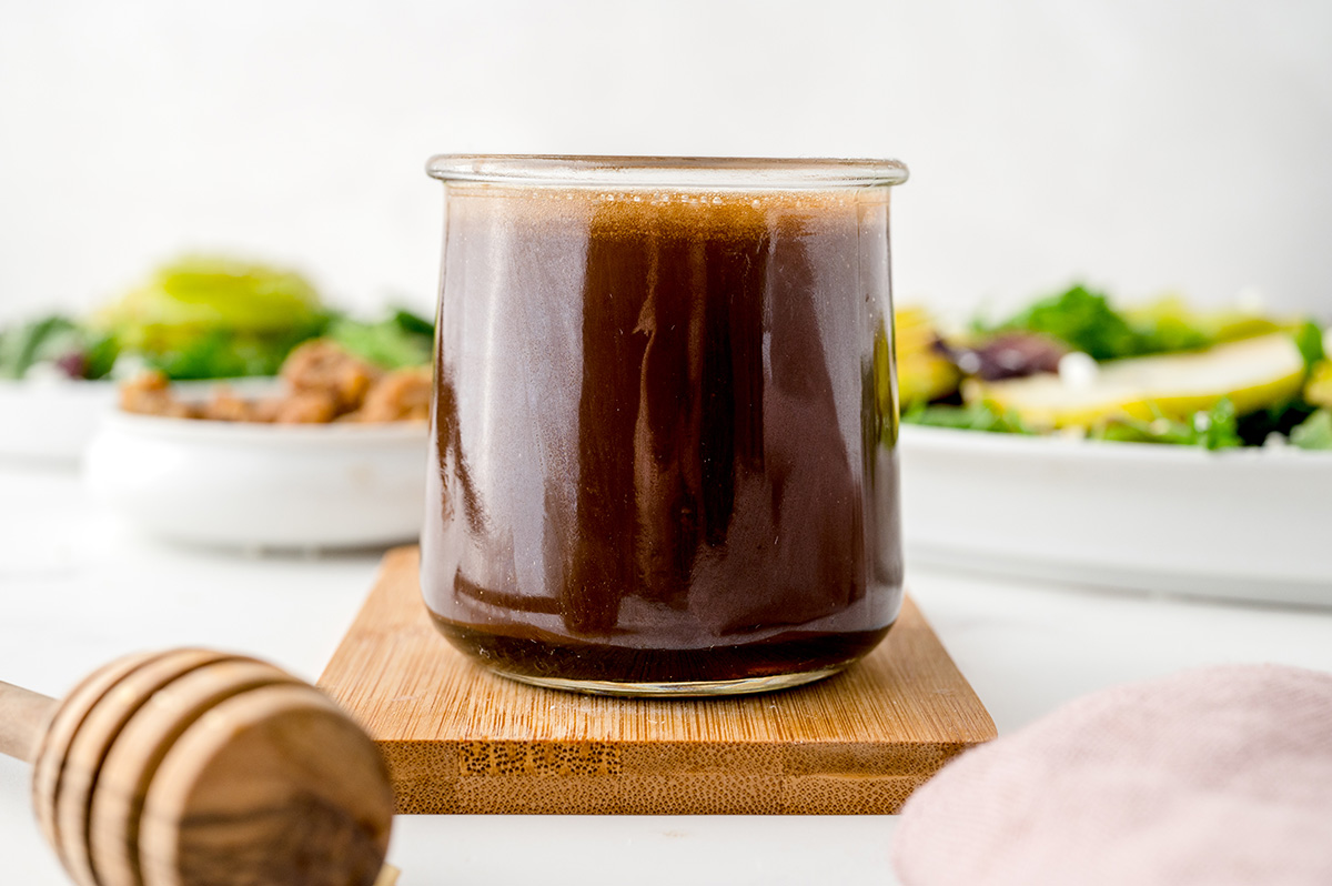 straight on shot of jar of honey balsamic vinaigrette