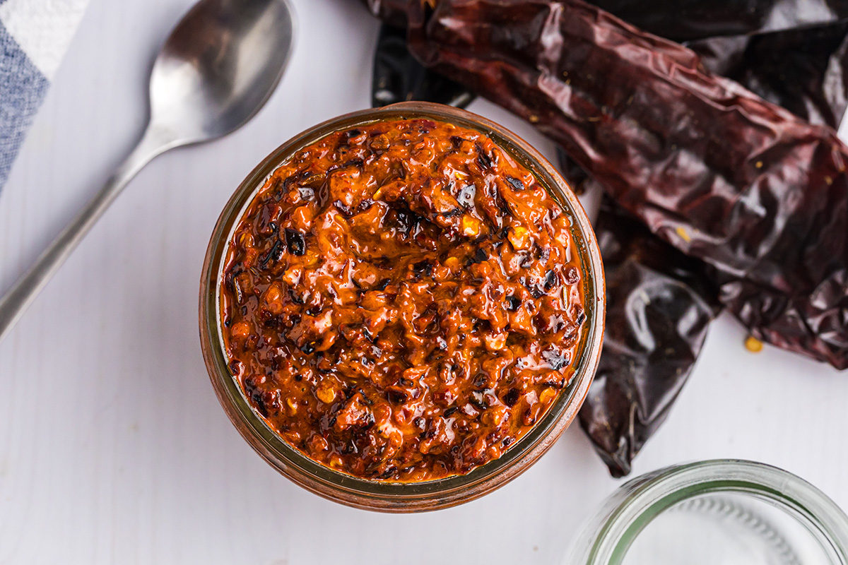 overhead shot of jar of harissa sauce