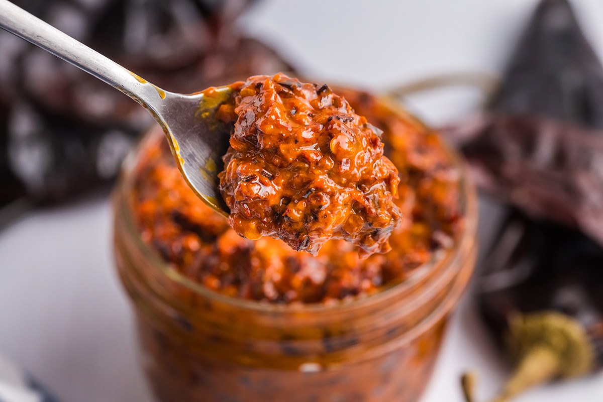 close up shot of harissa sauce on spoon