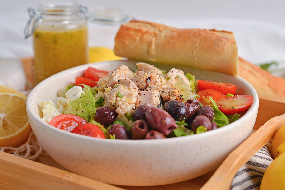 angled shot of bowl of greek salad