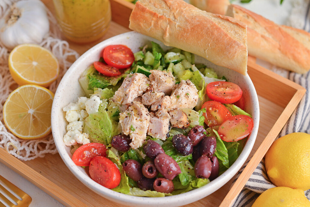 angled shot of bowl of greek salad