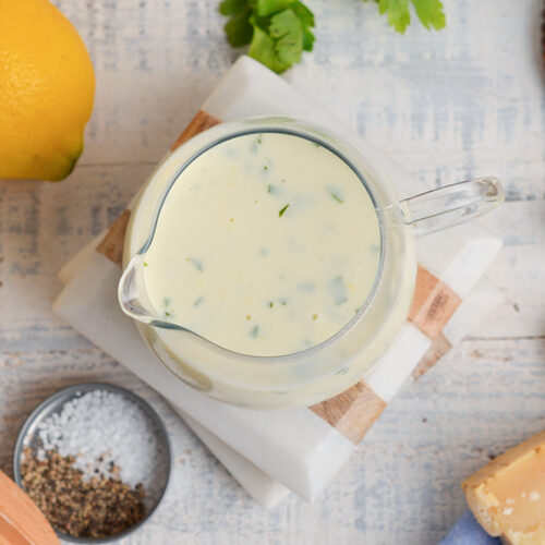 overhead shot of creamy sauce in jar