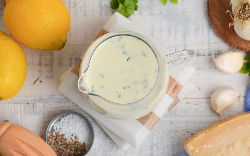 overhead shot of creamy sauce in jar