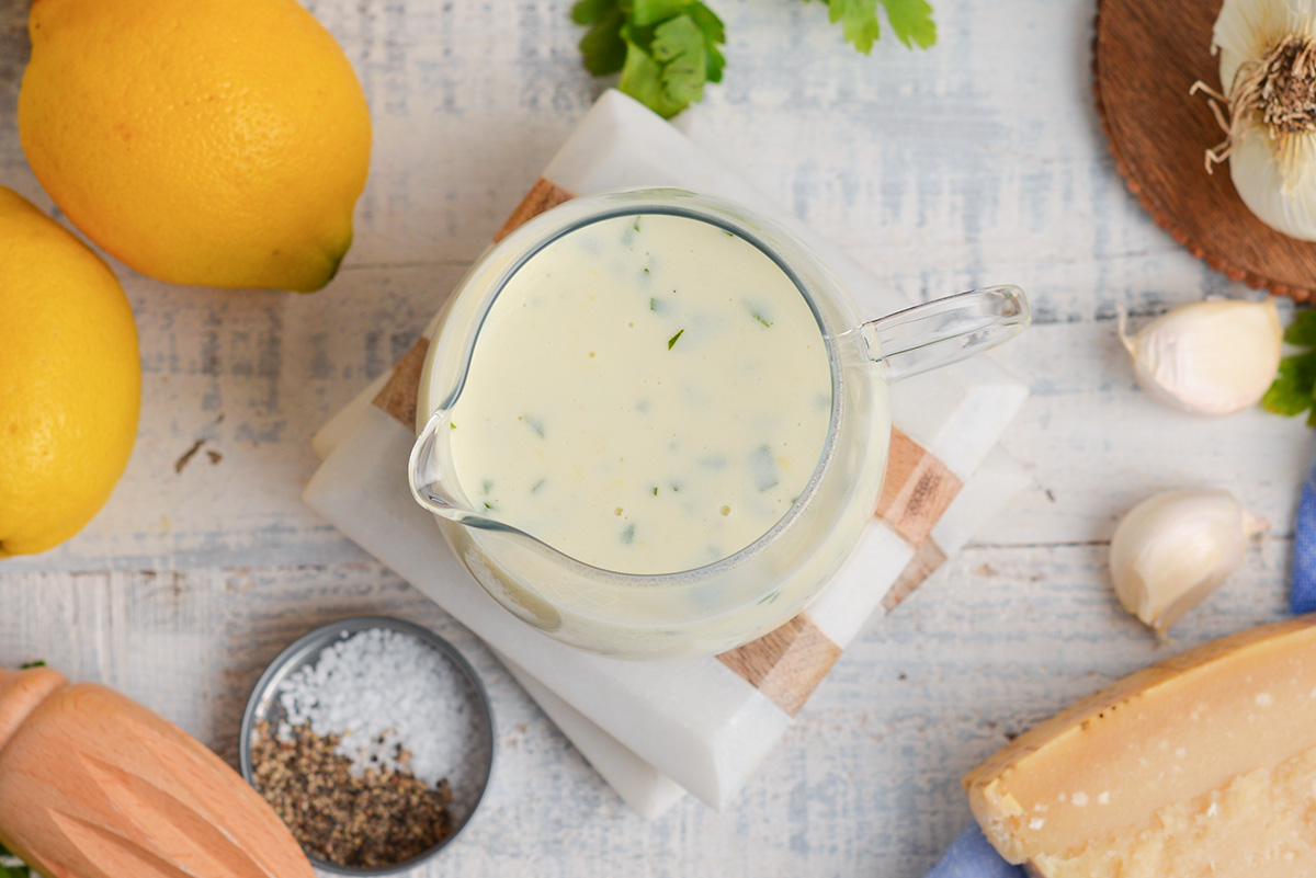 overhead shot of creamy sauce in jar