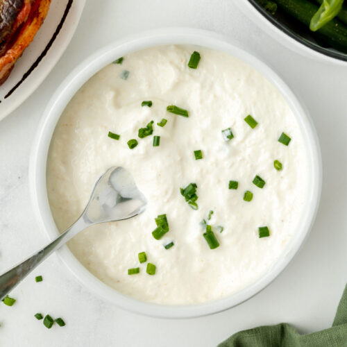 spoon in bowl of horseradish sauce