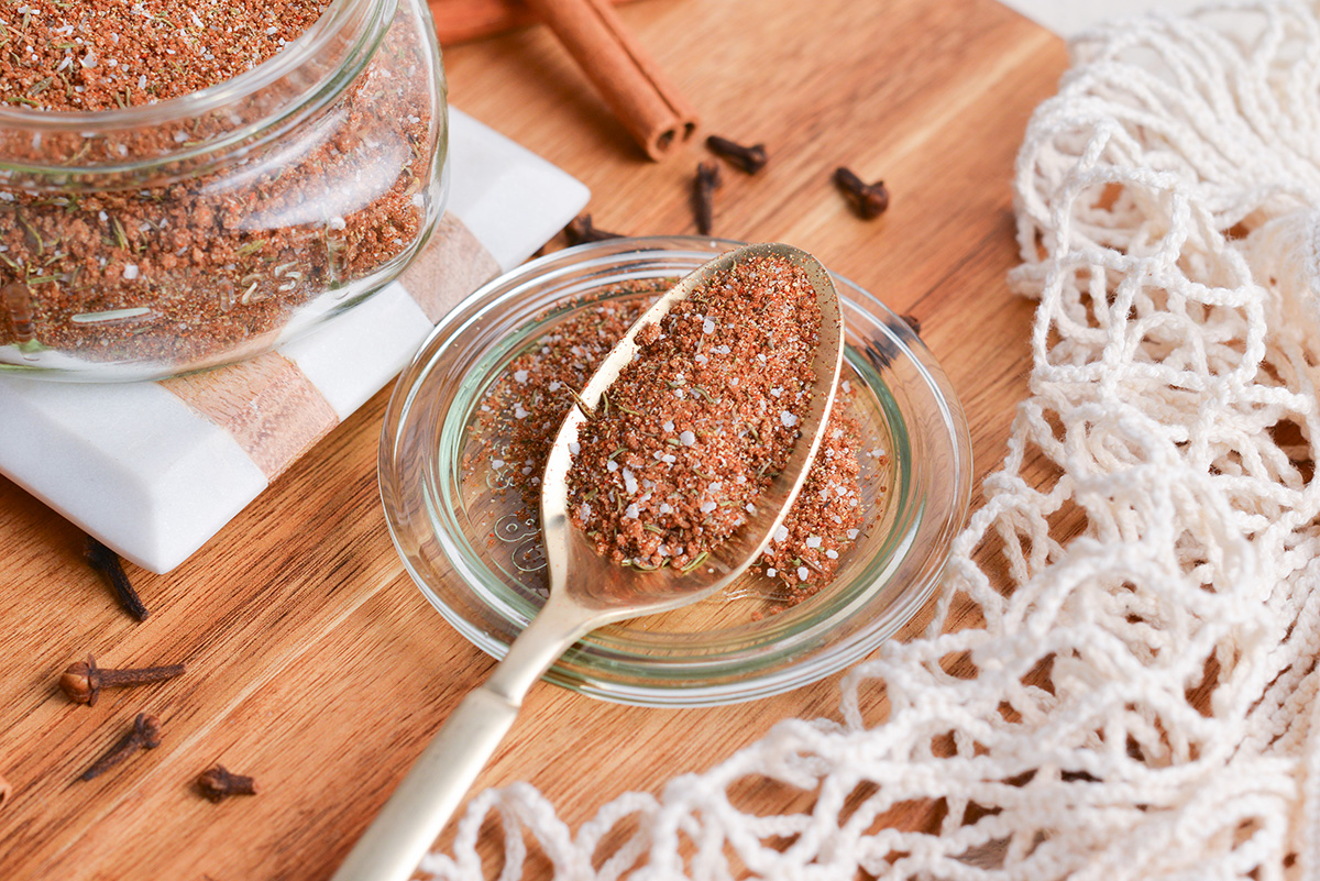 angled shot of spoon full of jerk seasoning