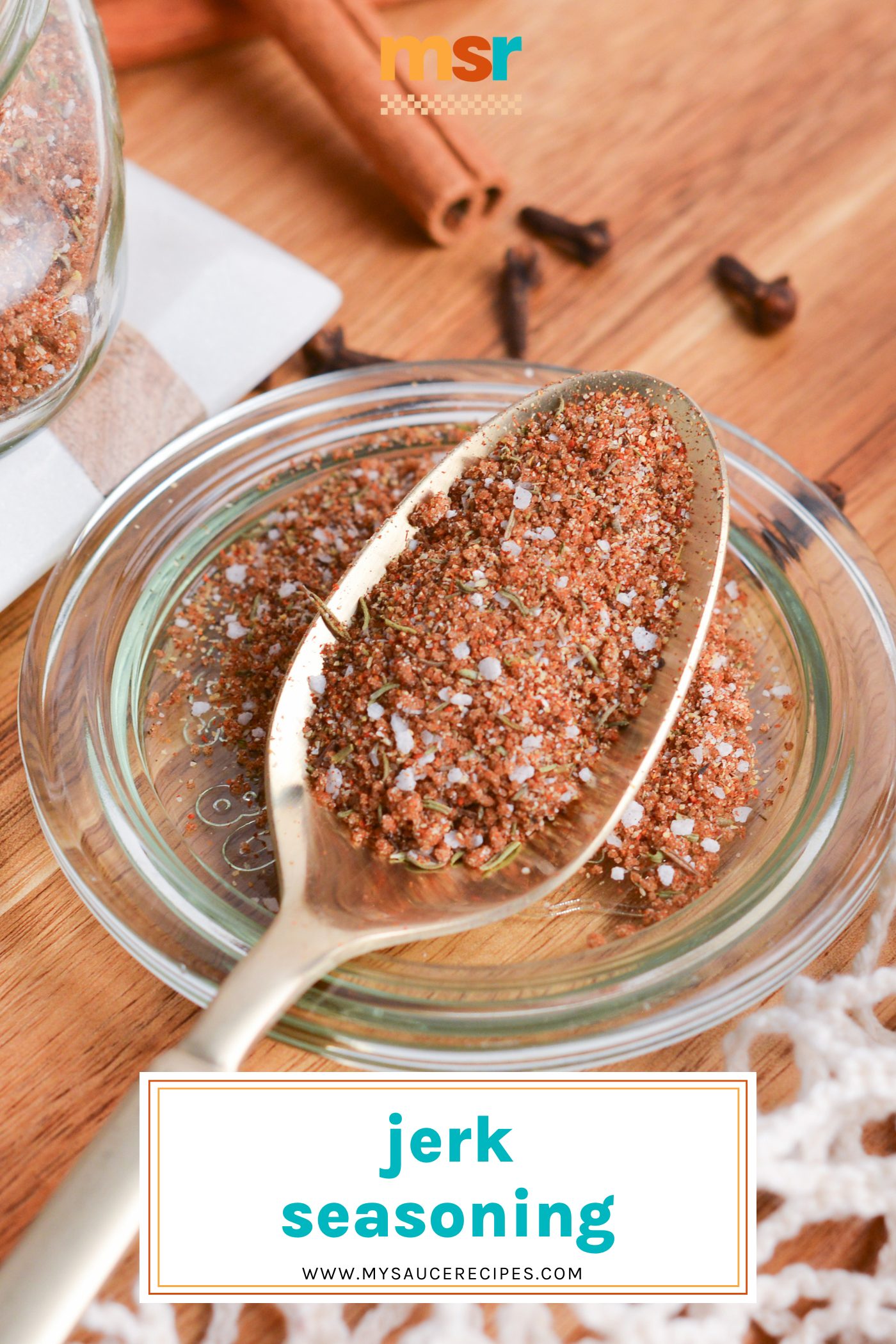 angled shot of spoon full of jerk seasoning with text overlay