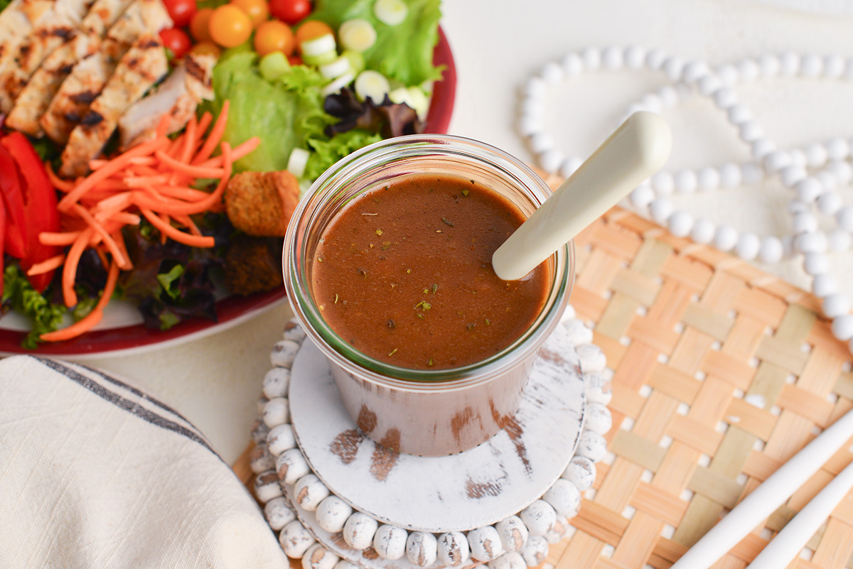 angled shot of jar of balsamic dressing