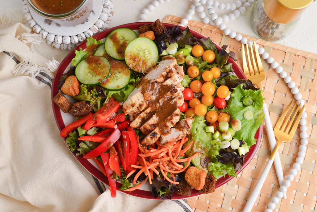 overhead shot of balsamic dressing on salad