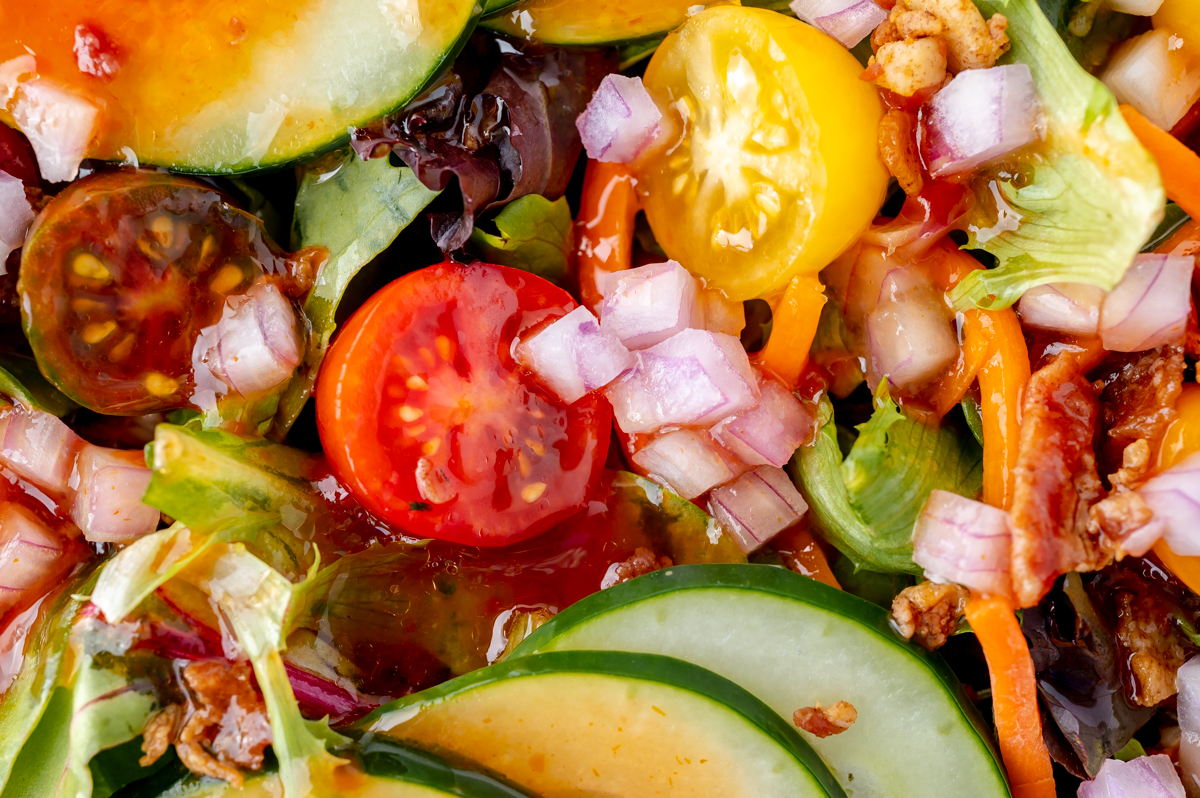 close up of salad topped with french dressing