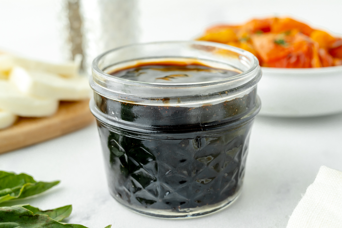 angled shot of jar of balsamic reduction sauce