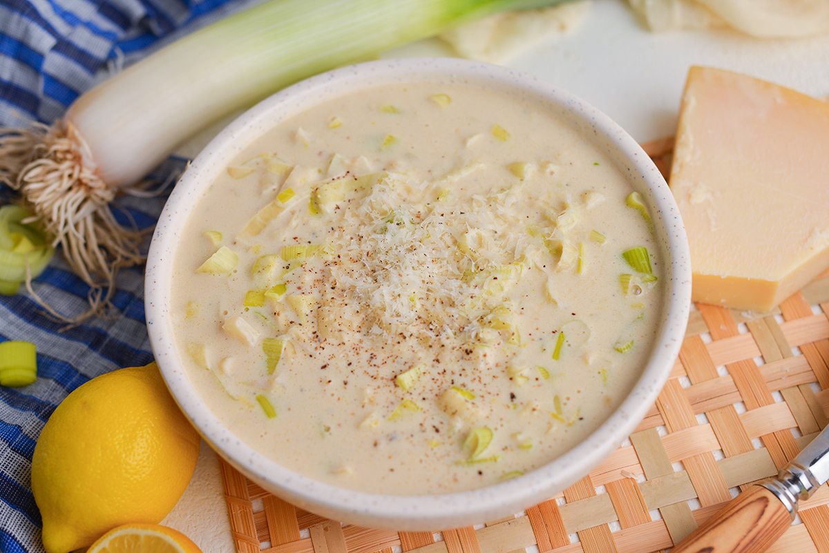 close up angled shot of bowl of creamy leek sauce