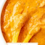 close up of fries dipping into chipotle mayo with text overlay