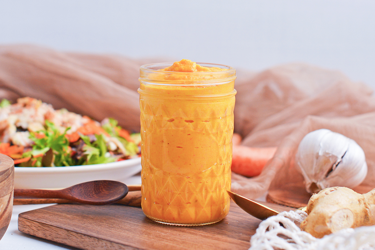 straight on shot of jar of carrot ginger dressing