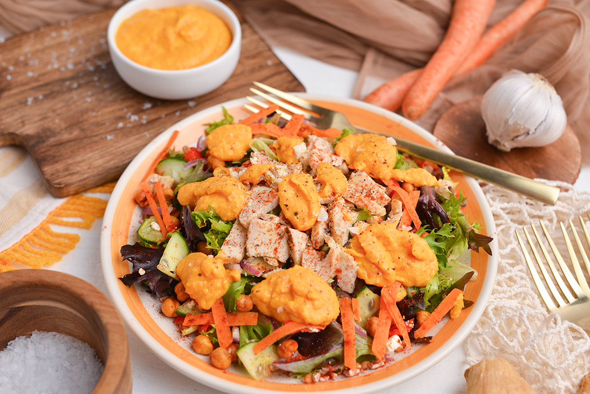 salad topped with carrot ginger dressing