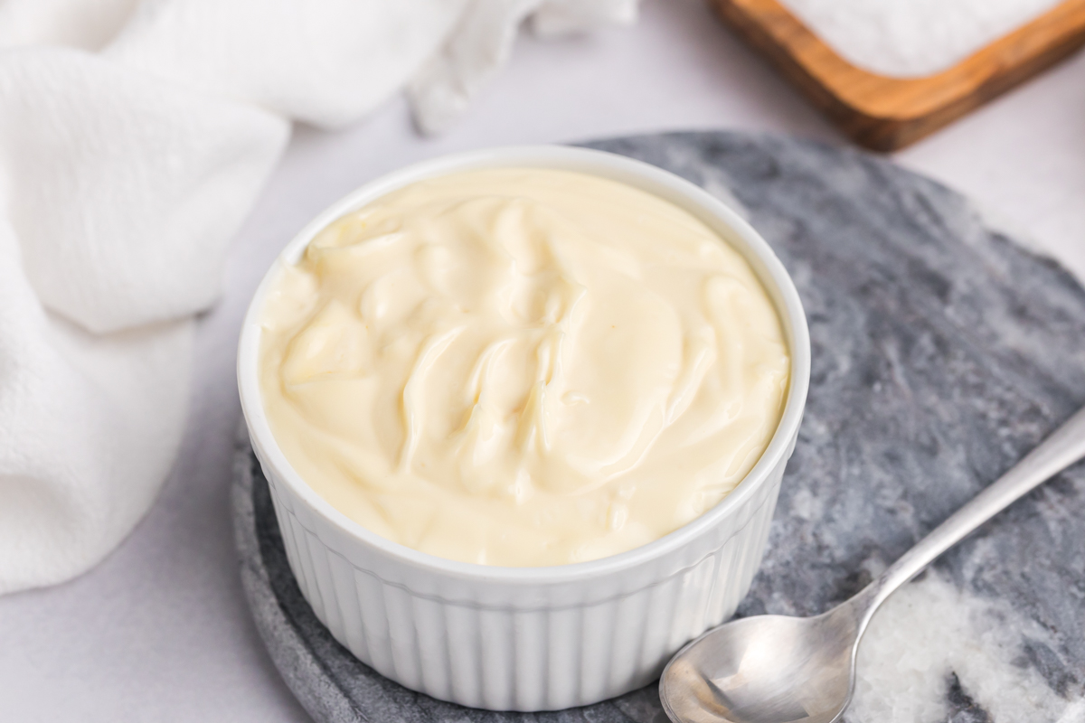 close up angled shot of homemade aioli in bowl