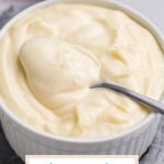 angled shot of spoon in bowl of homemade aioli sauce with text overlay
