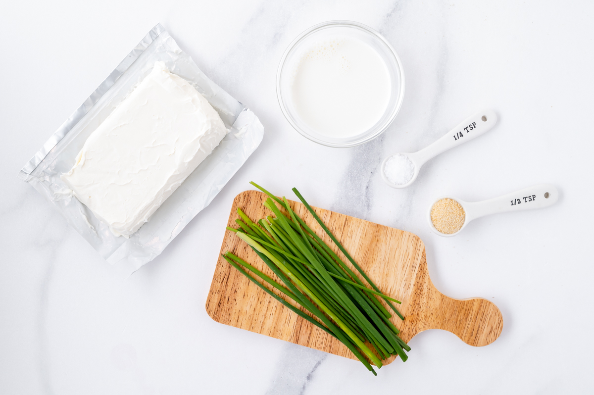 overhead shot of chive and onion cream cheese ingredients